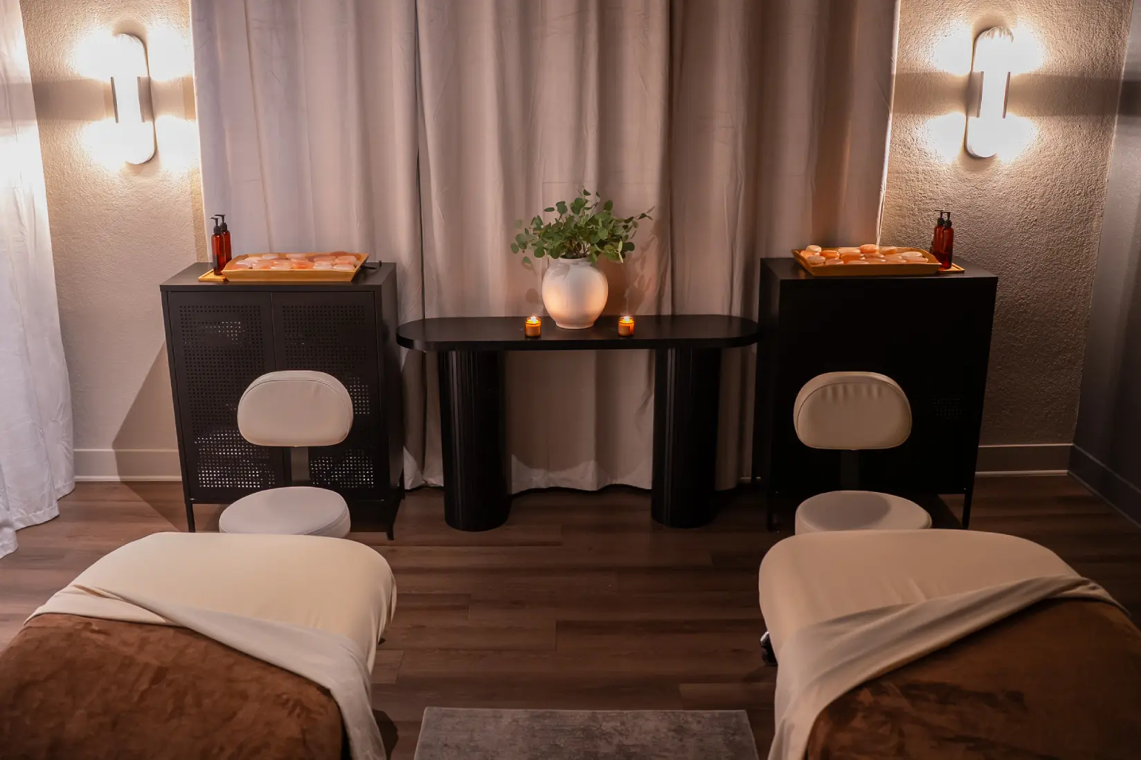 A warmly prepared private couples suite at Zen'd Out Englewood
